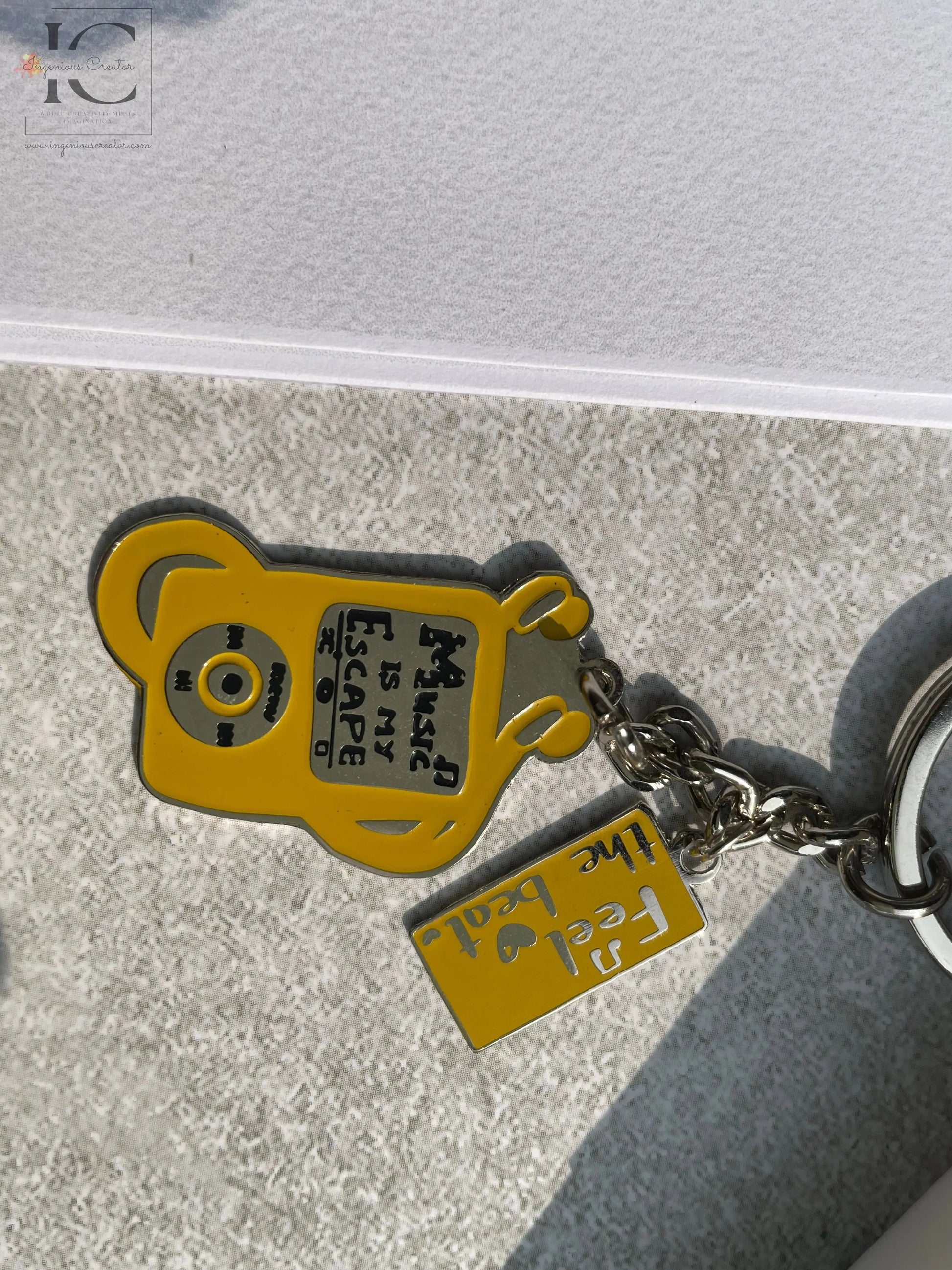 Feel the Beat Enamel Keychain - Ingenious Creator's Store