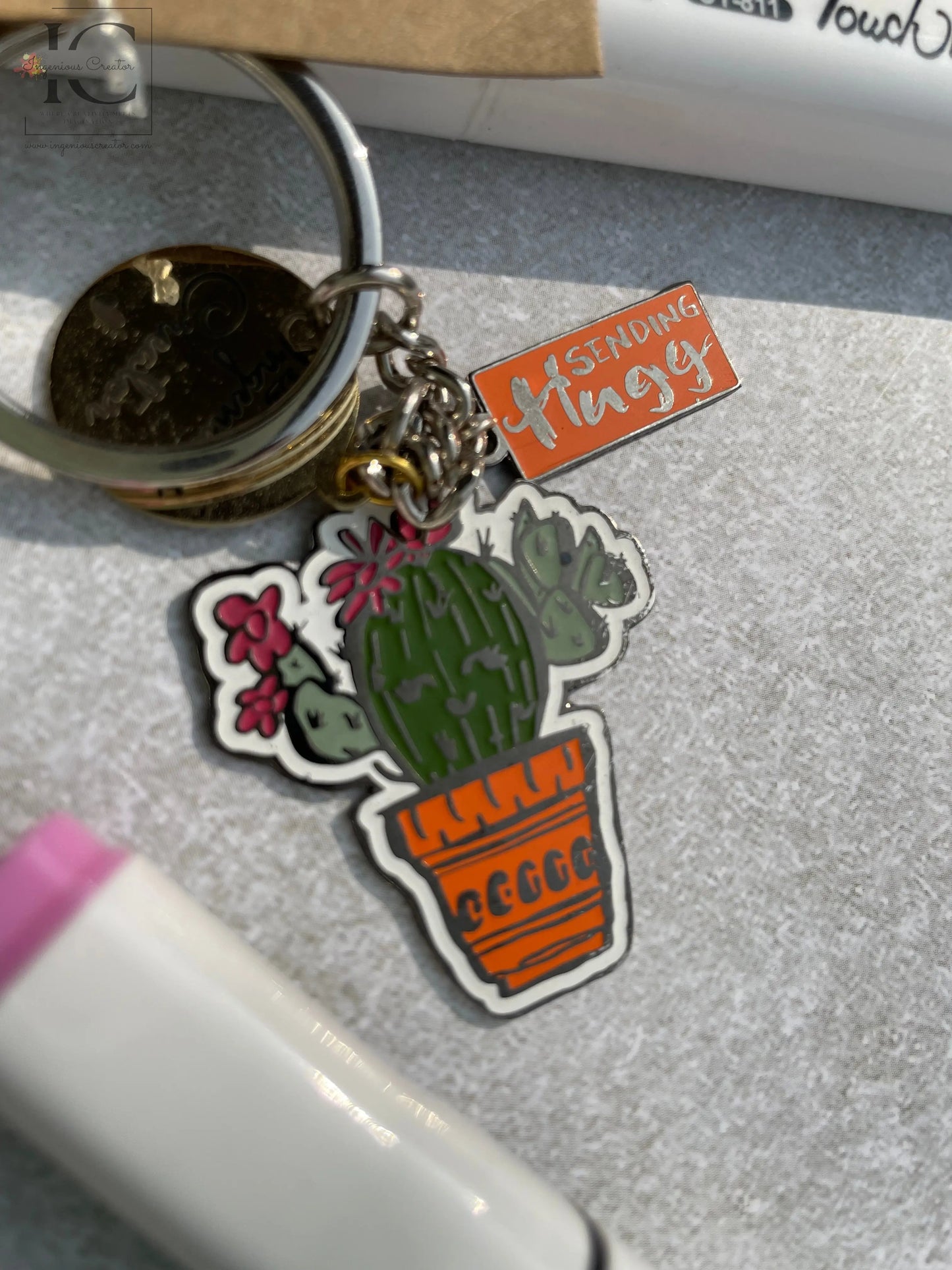 Sending Huggs Enamel Keychain - Ingenious Creator's Store